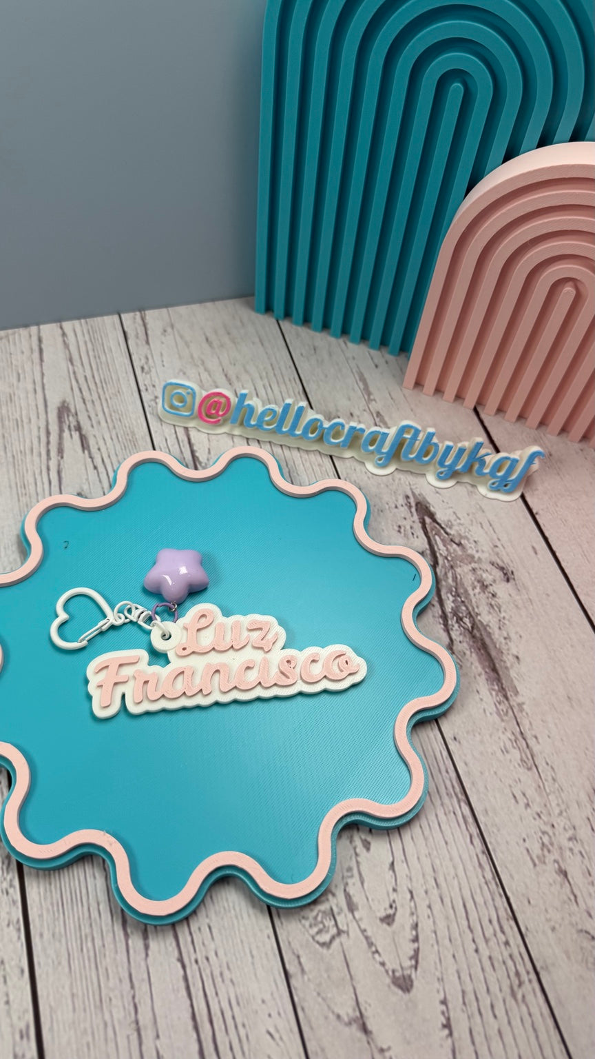 Personalized 3D name keychain displayed on pastel tray