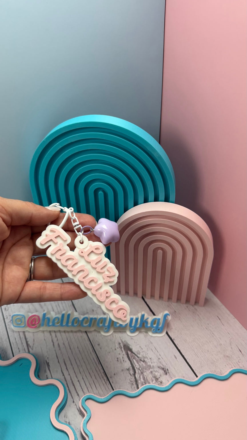 Personalized 3D name keychain held in hand