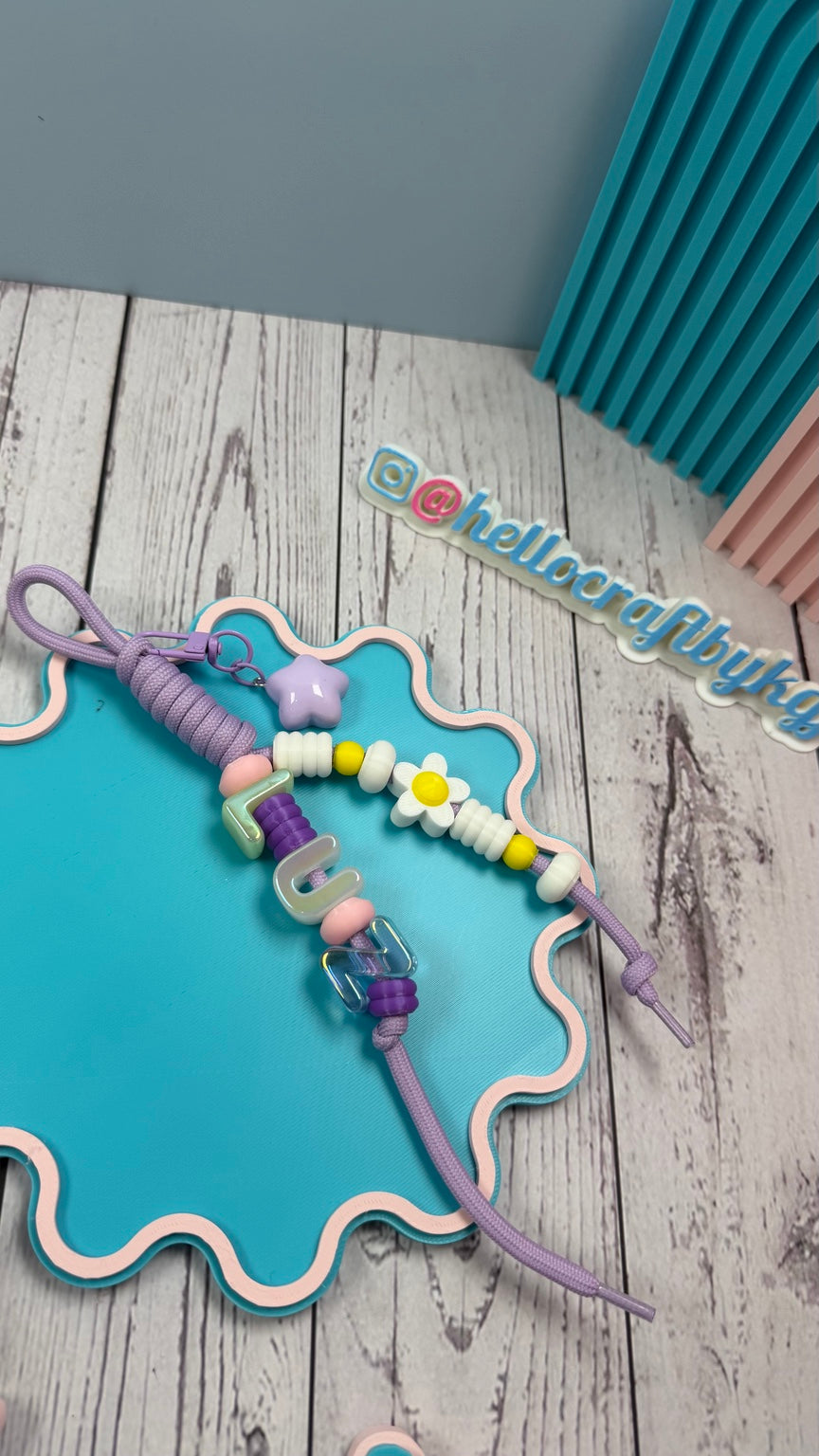 Personalized keychain charms with beads and cords