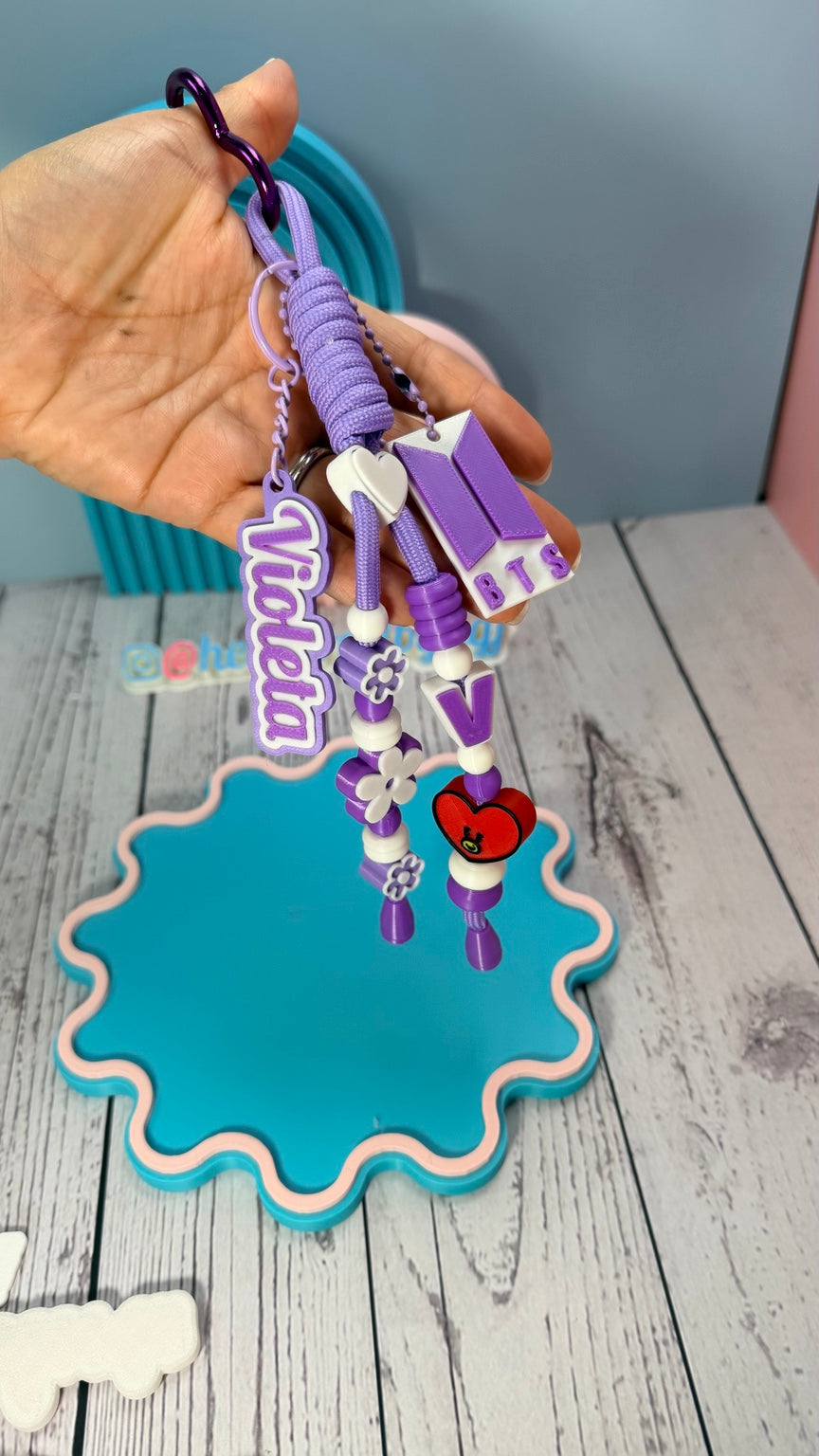 Purple personalized beaded wristlet keychain with custom name and decorative charms