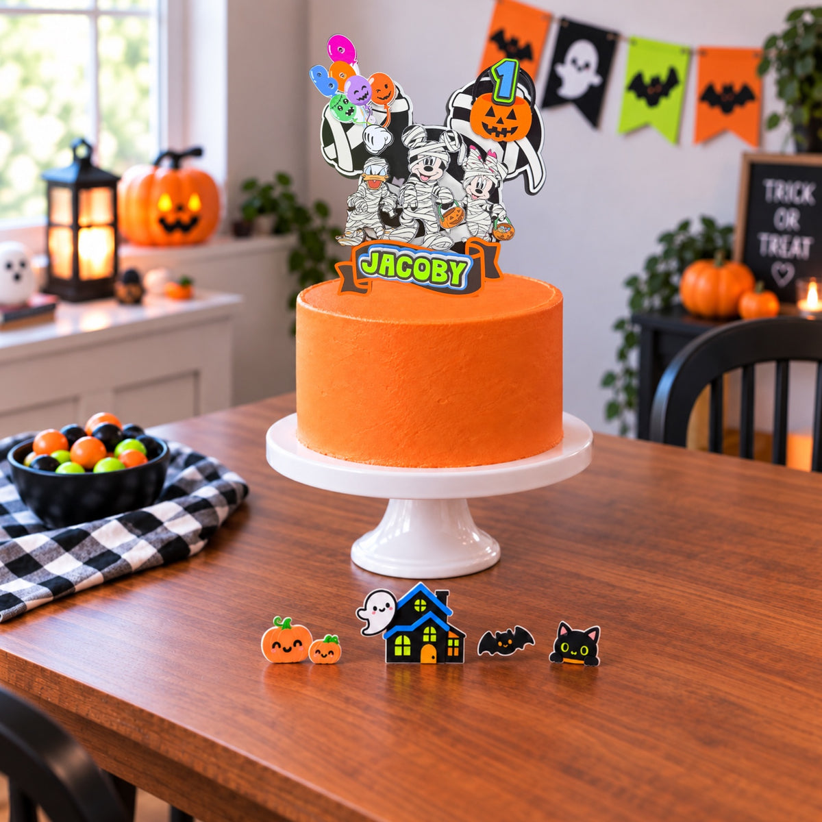 Personalized Halloween cake topper party setup